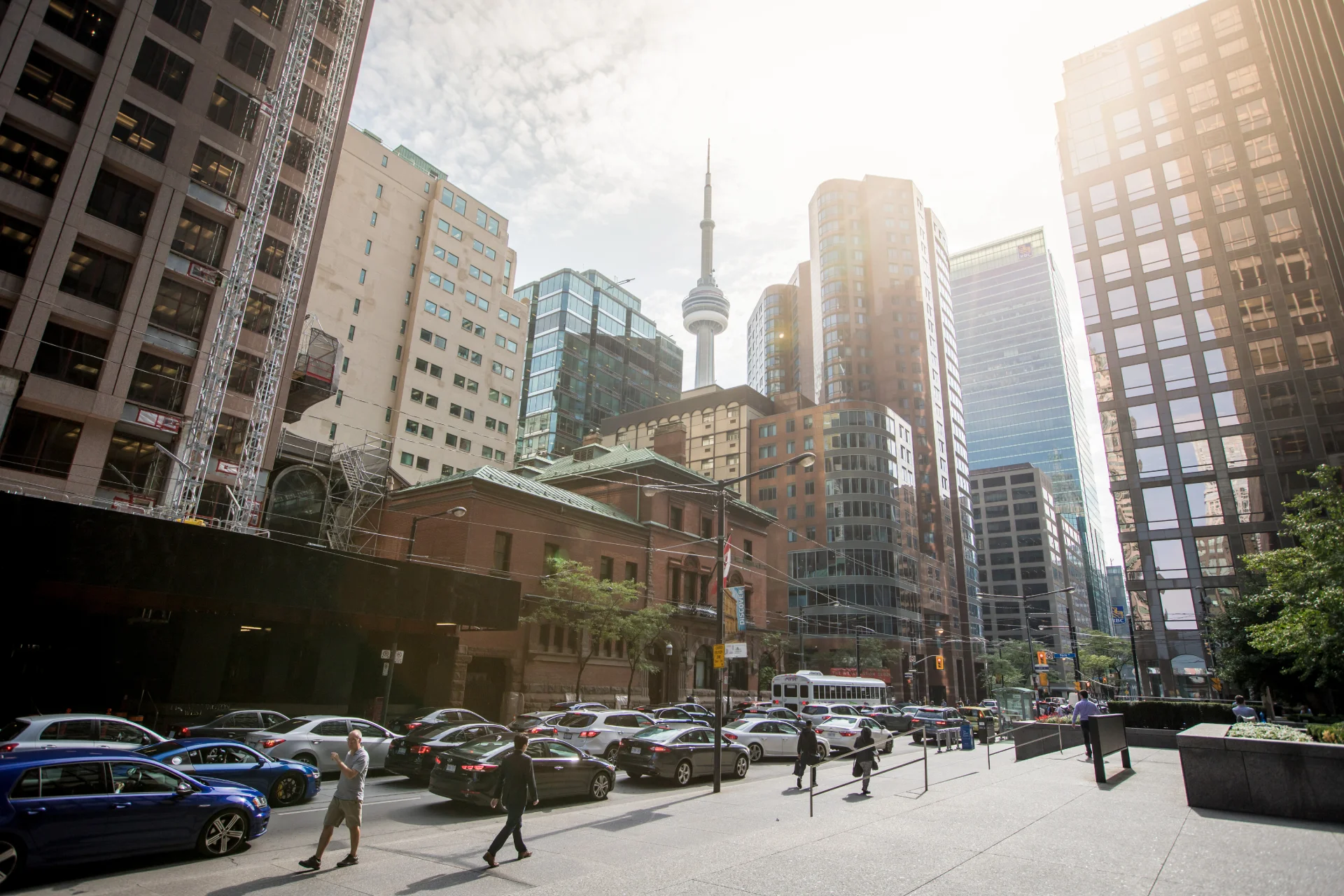 Downtown Toronto street with heritage buildings and the CN Tower