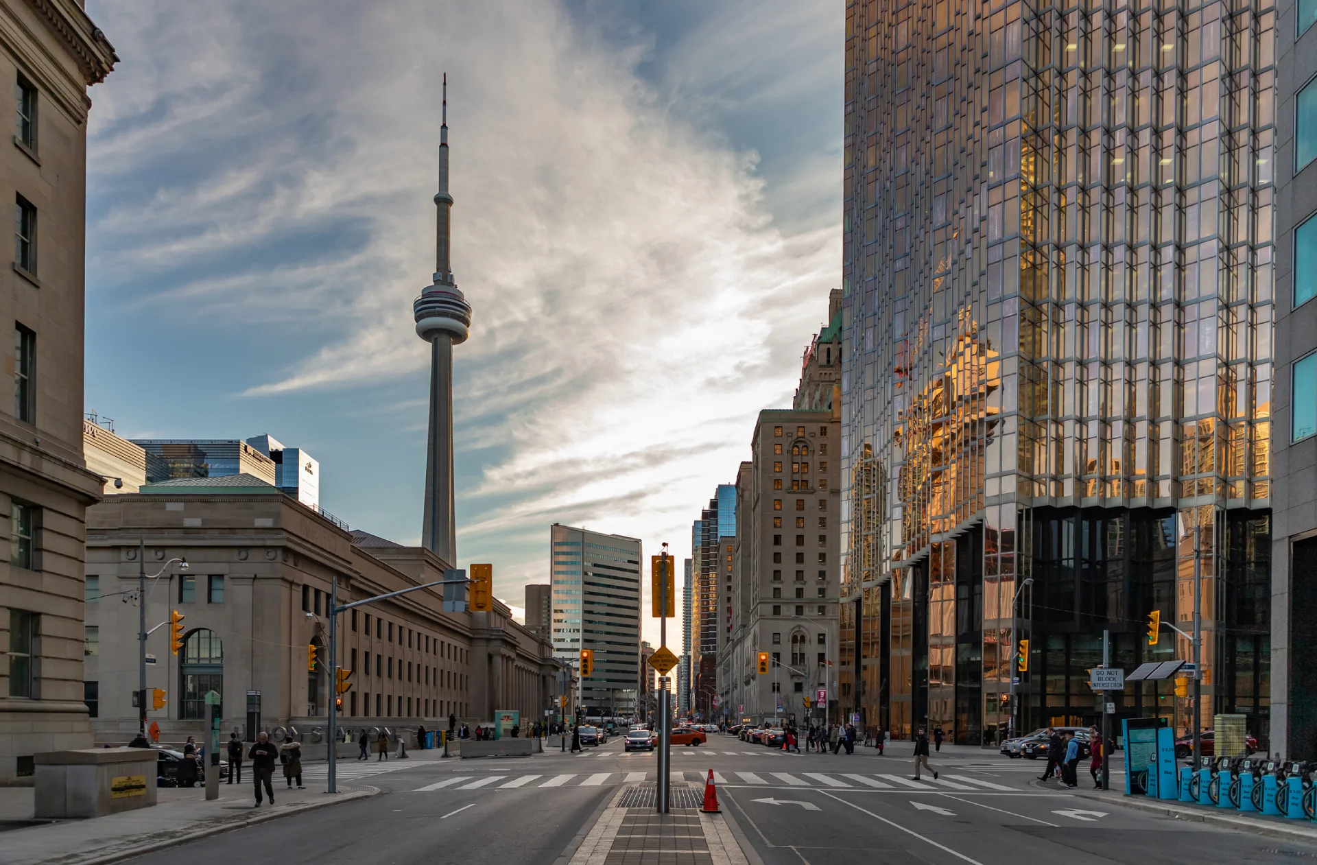 Downtown Toronto street with the CN Tower between office towers