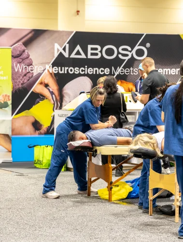Visitors at a neuroscience booth during a medical congress