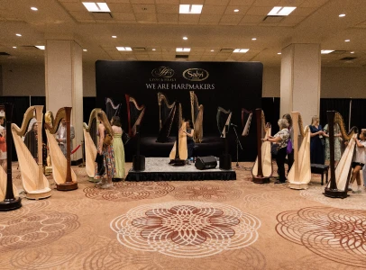 Rows of harps set up in a hotel ballroom