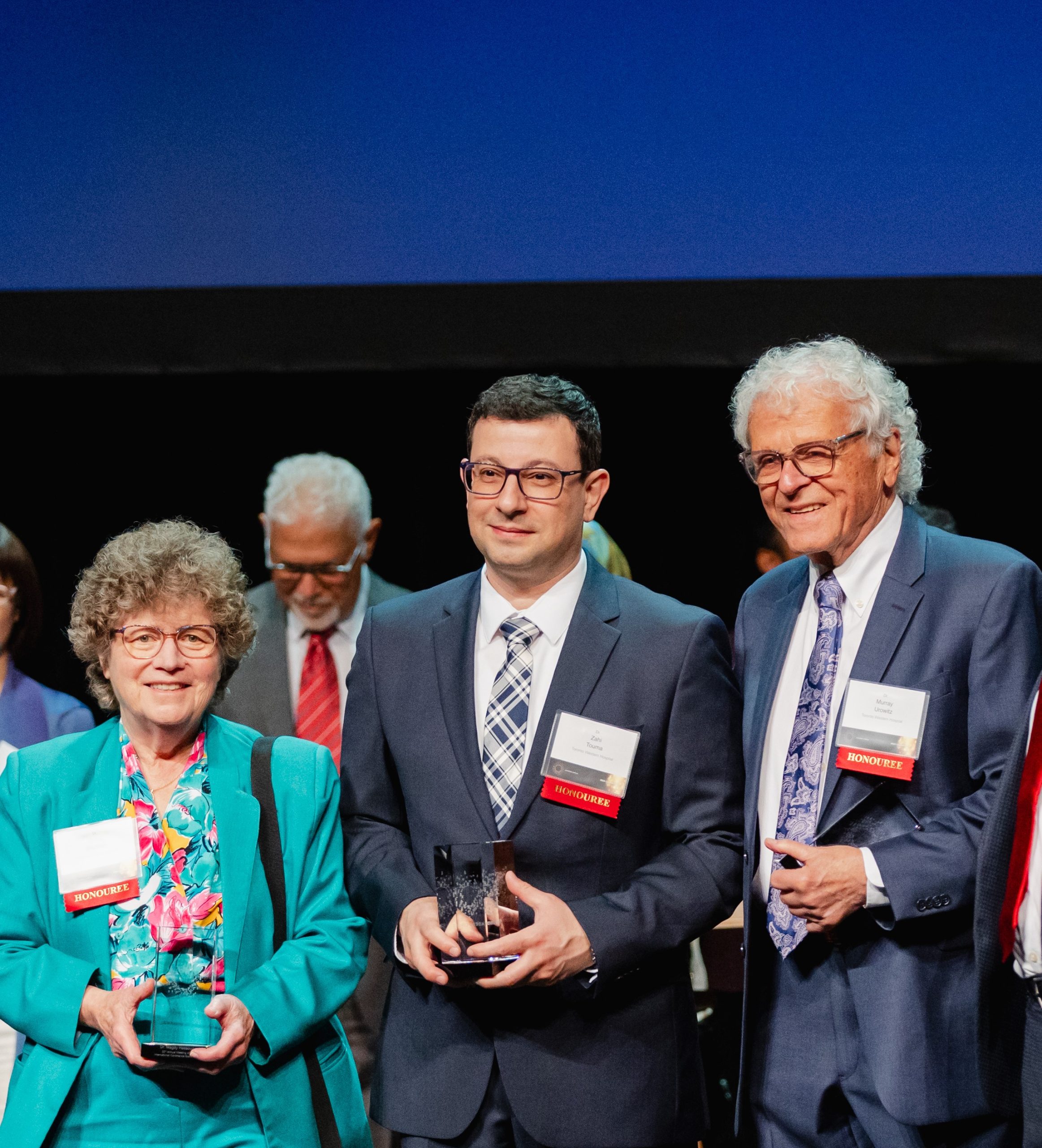 Group of delegates posing together at an international medical congress.