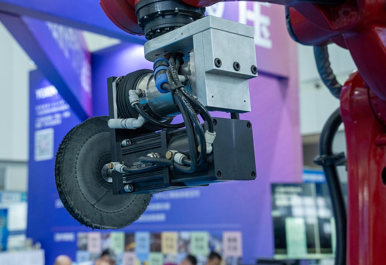 A robotic arm on display at an engineering exhibition