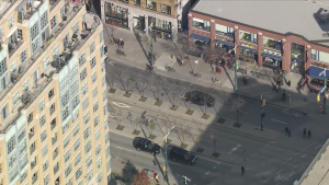 A busy downtown Toronto street corner seen from above