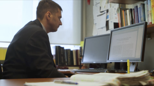 Prof. Kostas Plataniotis working at his desk