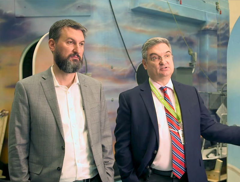 Dr. Milos Popovic and Dr. Alex Mihailidis seated together during a professional interview.