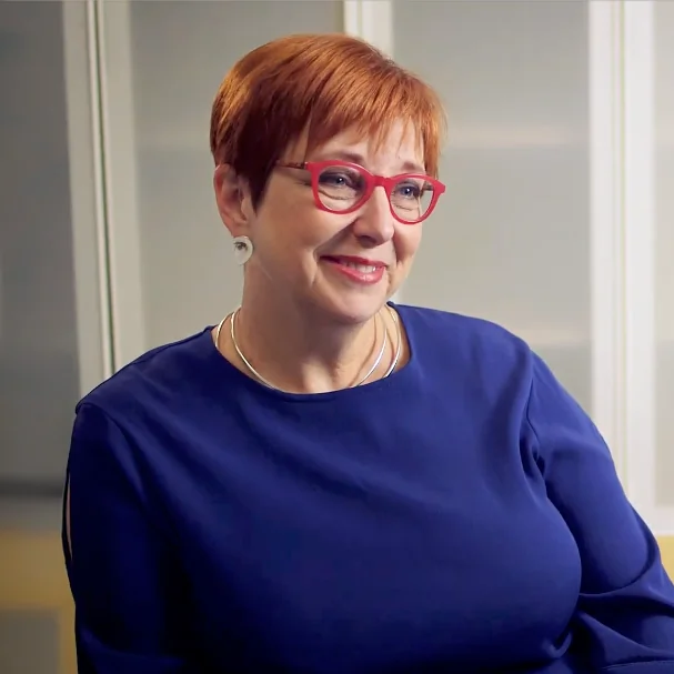 Portrait of Dr. Gail Darling wearing a blue top and smiling.
